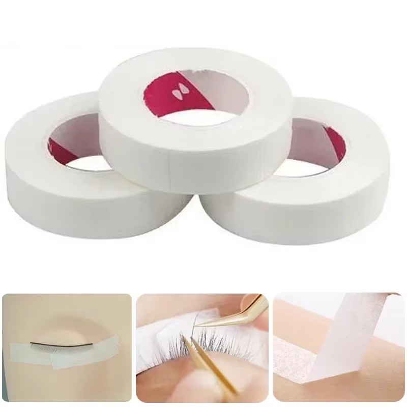 Venta al por mayor Injerto de pestañas cinta japonesa plantación de aislamiento de pestañas tela no tejida con agujeros cinta transpirable cinta de pestañas