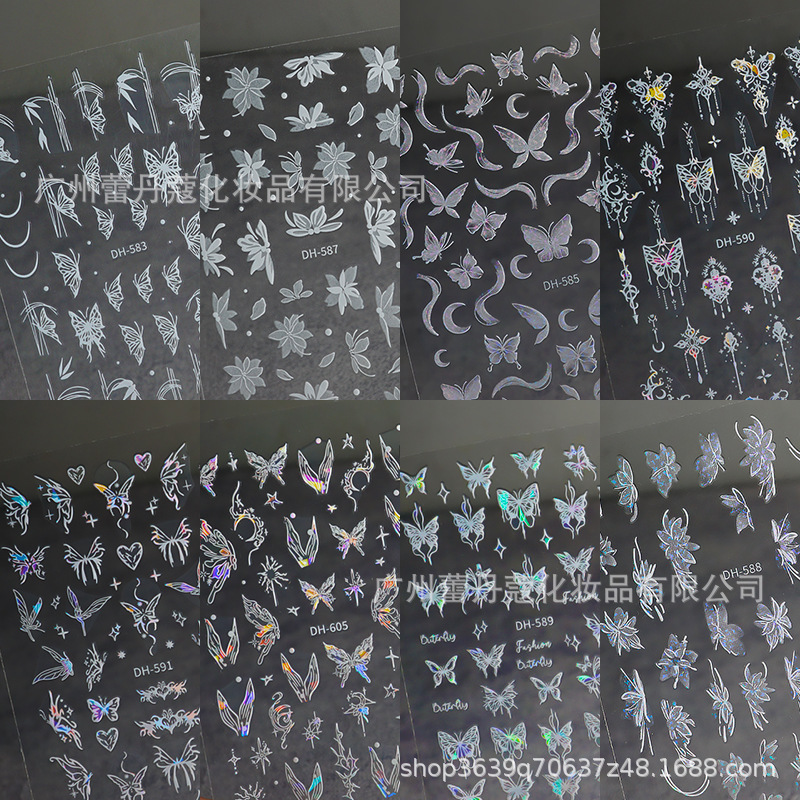 爆発的なネイルシールの上品な半透明な白い花びらの蝶のカラフルなオーロラガラスの破片には、ゴムの爪がついています|undefined