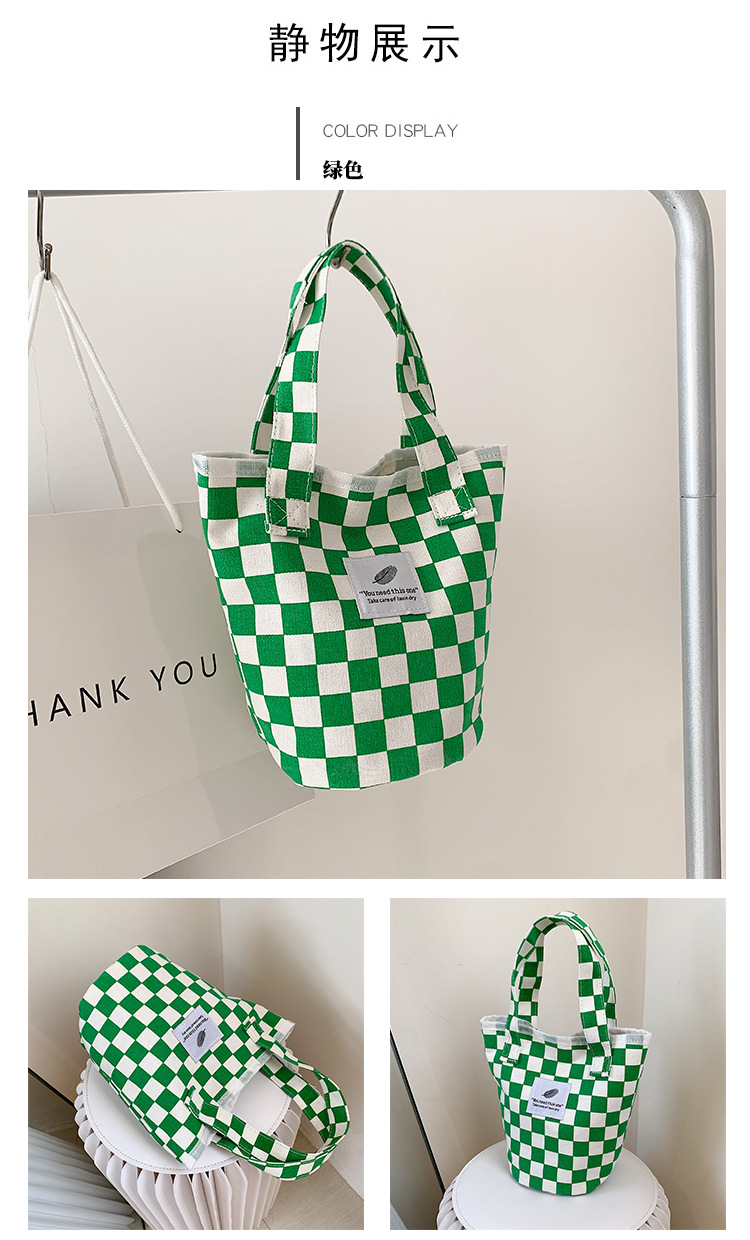A fashionable new Japanese and Korean chic black and white checkered canvas bag, a large-capacity single-shoulder bag for women, and a simple student handbag undefined