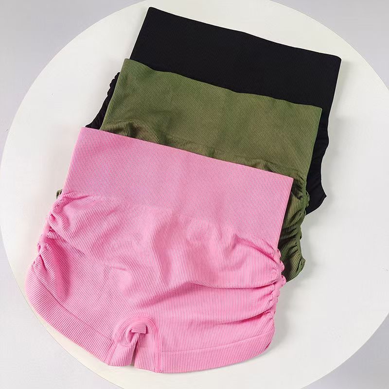 Europa y América Pantalones laterales plegados de tres partes de mujer cintura alta sin costuras pantalones cortos deportivos apretados pantalones de gimnasio transpirables de alta elasticidad