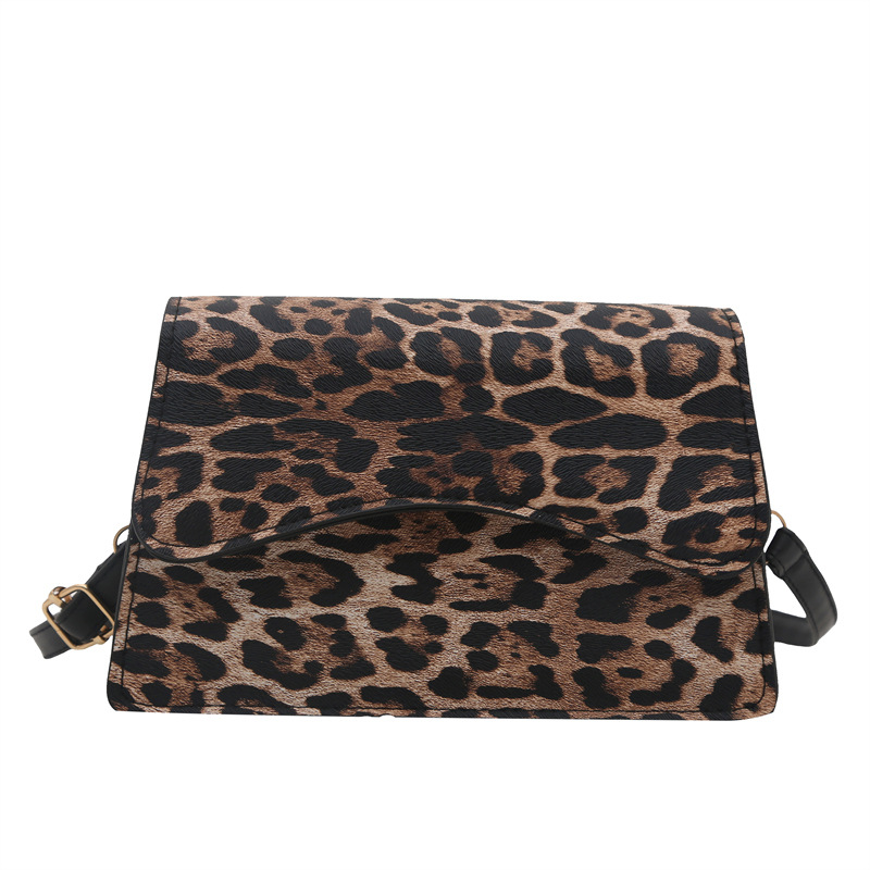 Bagos de brazo estampados de leopardo de estilo extranjero mujeres 2025 primavera de moda europea y americana retro viaje bolso de hombro bolso de forma pequeña