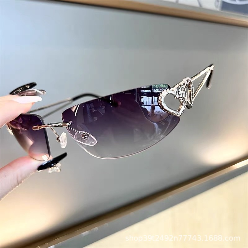 Mercury Lens Rimless Sunglasses for Women, High-End Cat-Eye Style, Trendy Heart-Shaped, Unique European and American Cycling Sunglasses Wholesale