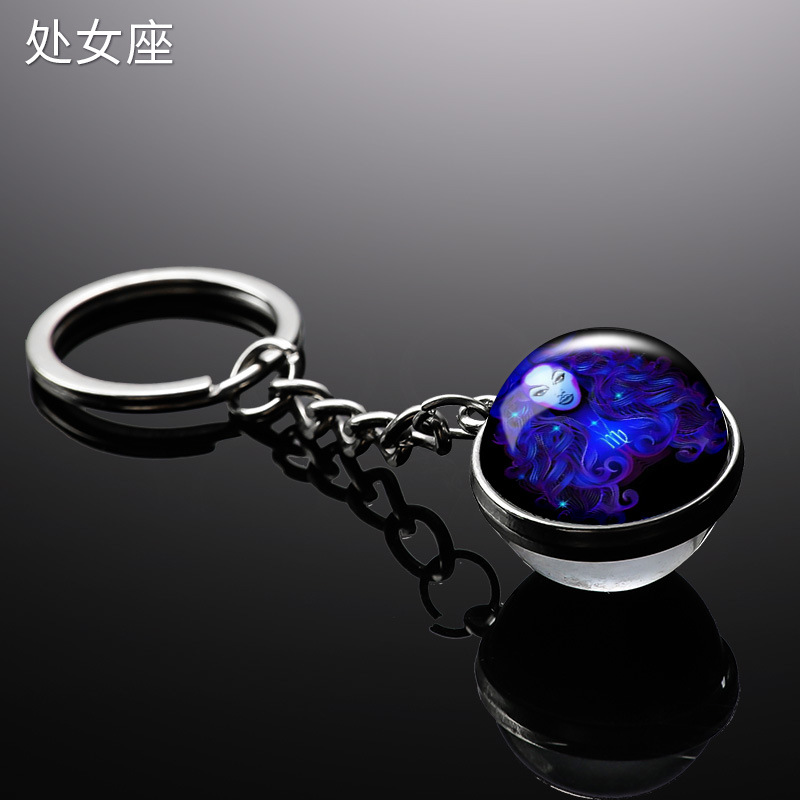 Transfronterizo 12 constelaciones de luz nocturna bolsos colgantes de bolsas de joyas de tiempo doble cara bola de vidrio llavero al por mayor