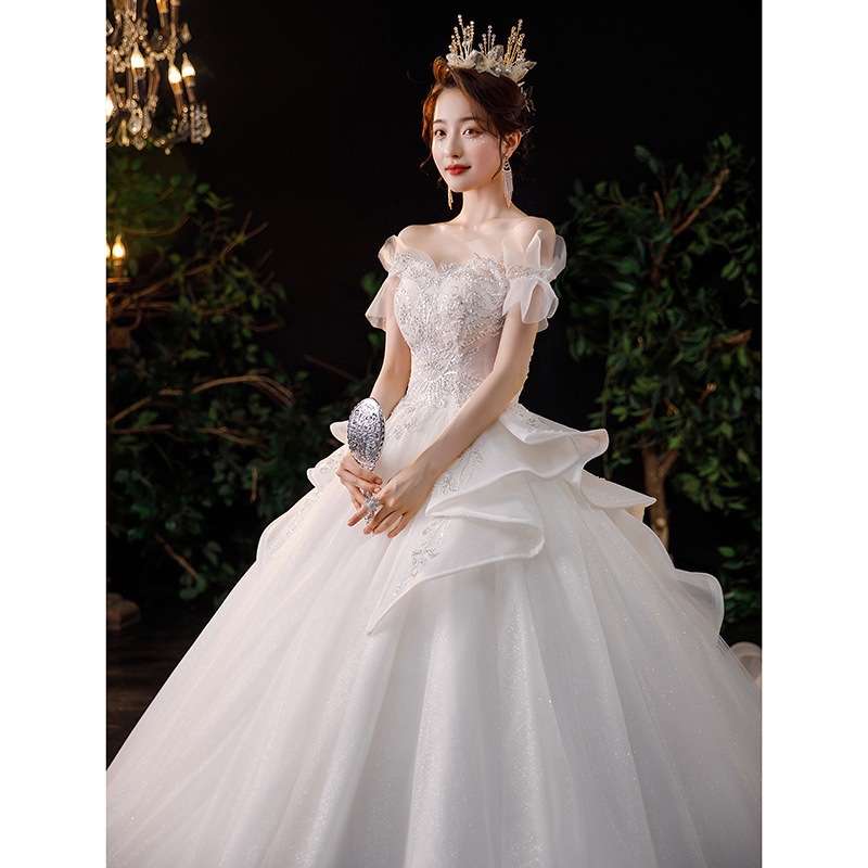 Vestido de novia estilo francés, nueva colección primavera 2026 para novias, vestido principal de hombros descubiertos, estilo princesa de palacio con cola larga, vestido de tul ligero. image 7