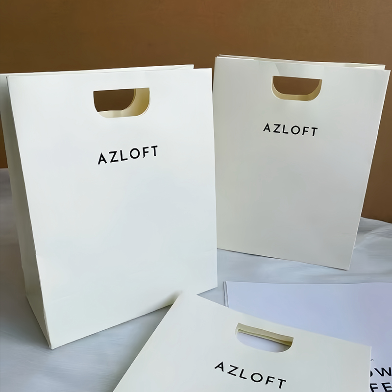 Bolsas de papel perforadas sin mango, bolsas de mano personalizadas para hacer logotipo, bolsas de regalo, empaque de compras de ropa de papel engrosado