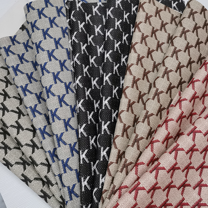 PVC皮革0.6mm针底字母K字印花纹包装盒手机壳化妆包文具袋人造革