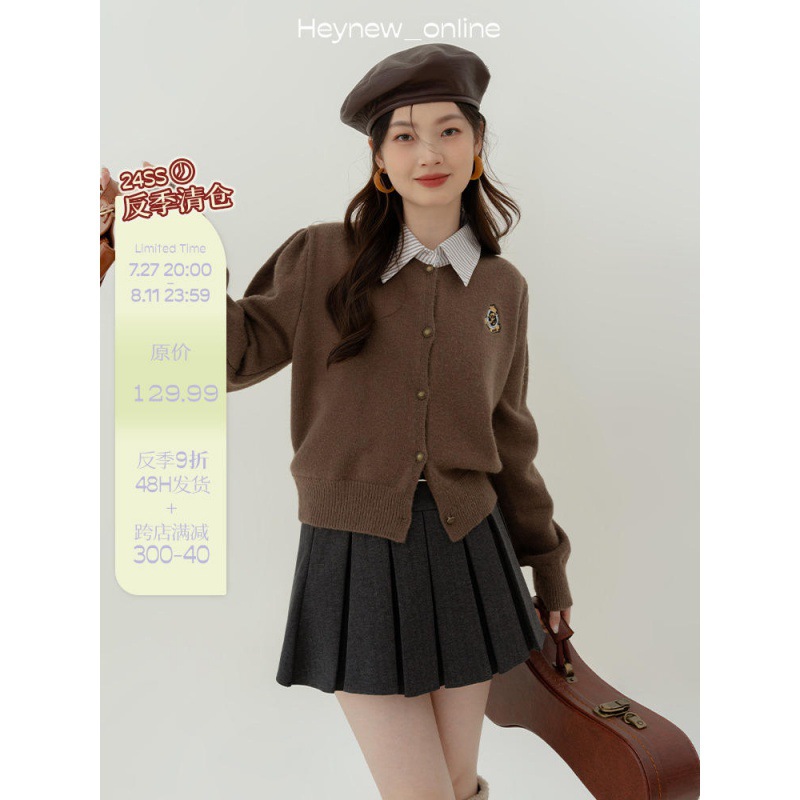 偽の2枚の学院風polo襟のカーディガンのセーターの女性秋冬のデザイン感の小さい人たちはニットのカーディガンを着ます。