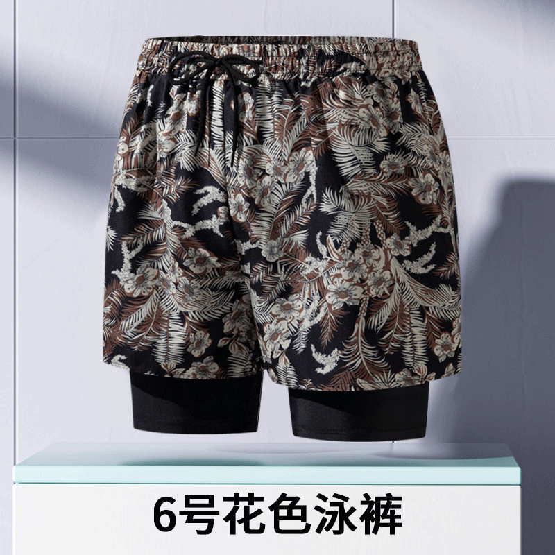 Pantalones de baño de hombre para adultos nuevos anti-vergüenza de doble capa de ángulo plano profesional de secado rápido de moda relajada alta elástica gran tamaño de arena