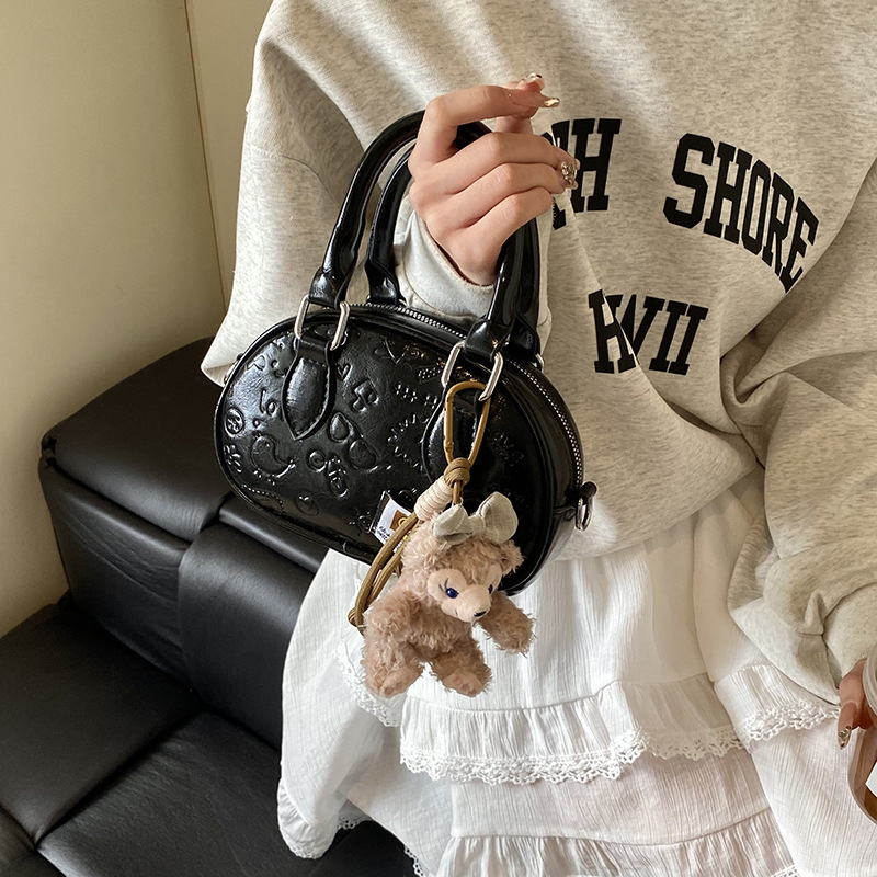 Nicho de diseño de bolso de mano de alta calidad para mujeres 2025, nuevo estilo de moda universal para viajar ocio simple bolso de mochila