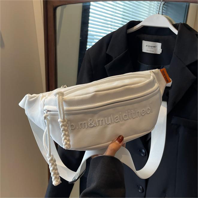 Bolso de pecho coreano de lienzo de letras mujeres 2025 nuevo bolso de hombro de estilo deportivo casual popular bolso de mochila de fuego universal
