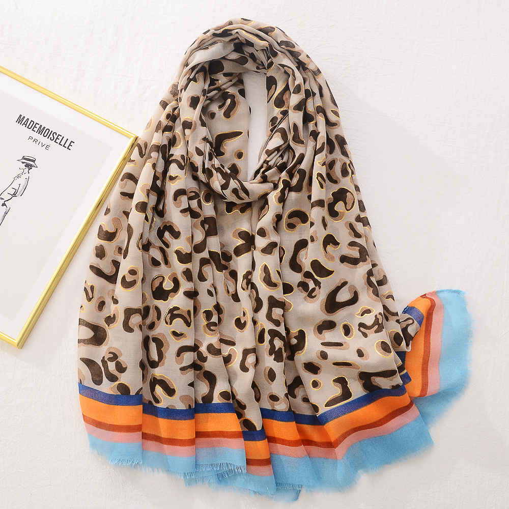 Moda estilo europeo y americano estampado de leopardo bronceado algodón y lino sensación bufanda de seda de moda todo fósforo bufanda grande viaje protector solar Toalla de playa para las mujeres