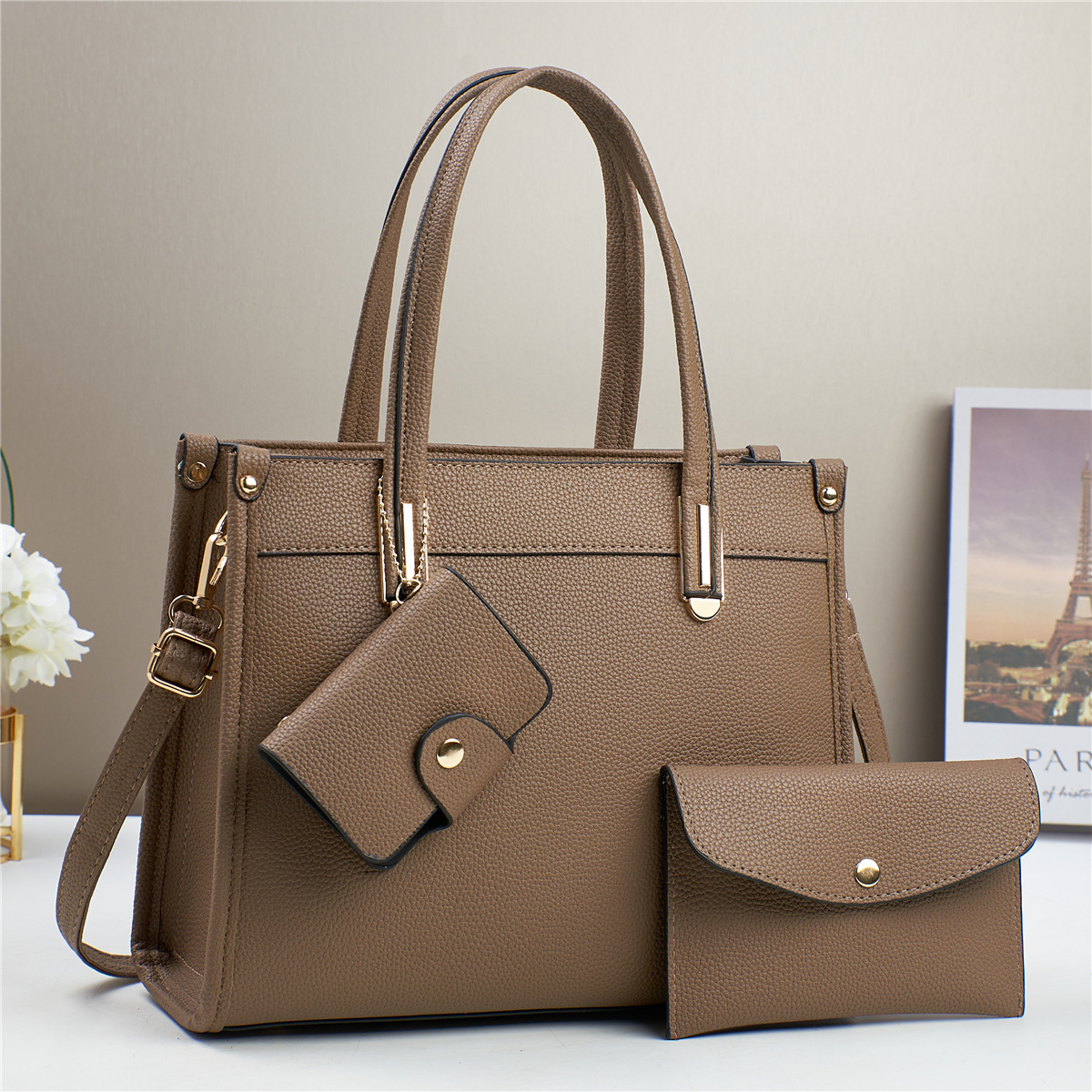 Fabricantes bolsos de comercio exterior mujeres 2025 nuevo bolso de mano mano textura de hombro liso inclinado bolso de moda de mujer coreana