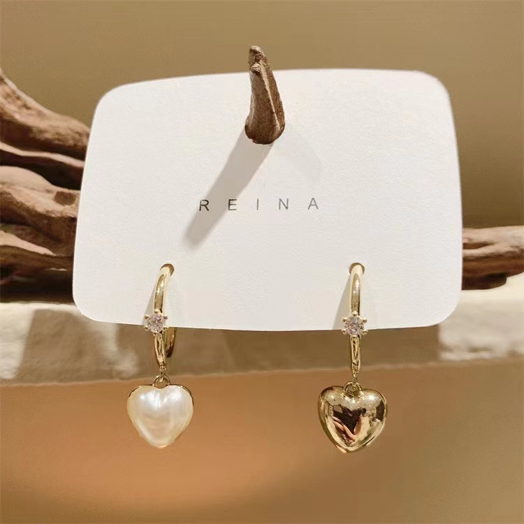 Fashionable elegant trend creative small design earrings heart…