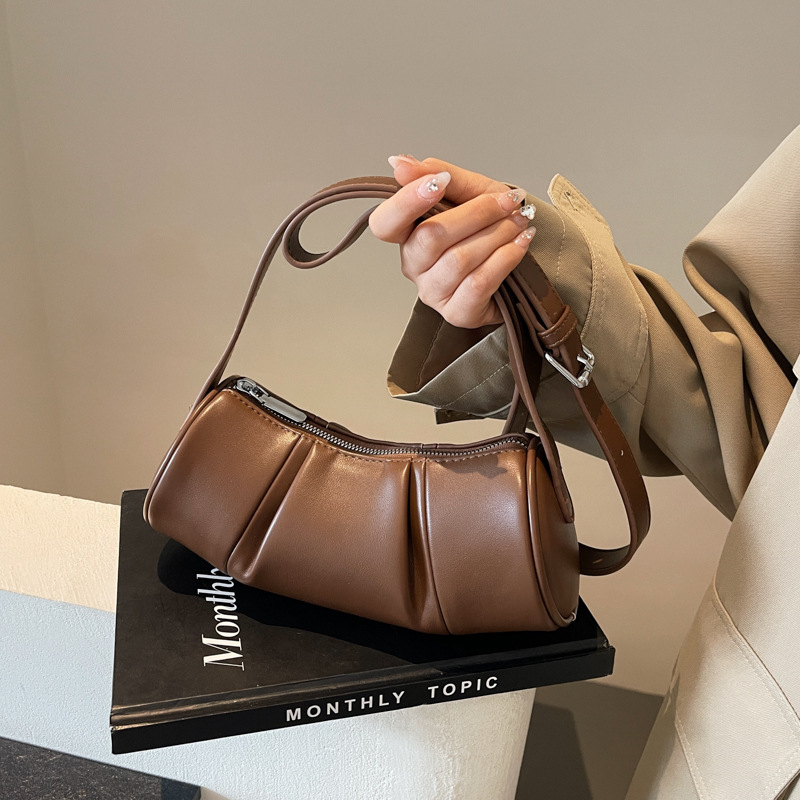 New Summer Women's 2024 Versatile Light Luxury Simple Pillow Texture Single Shoulder Crossbody Folded Cylinder Bag_voghion.com