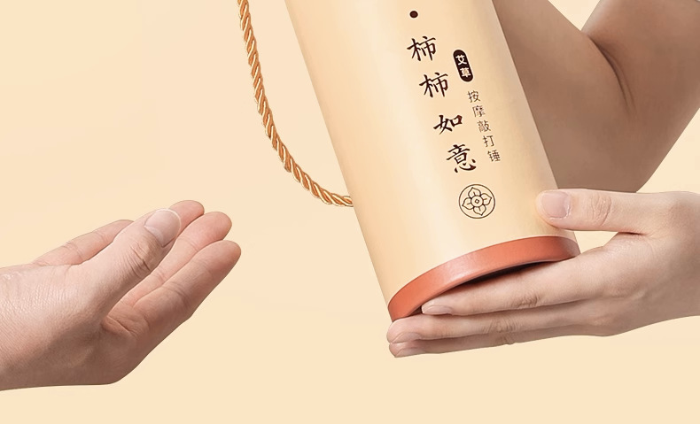 Mugwort Massage Hammer Ai Cao Hammer 33cm Herbal Beating Stick for Full Body Relaxation Gift Box in use