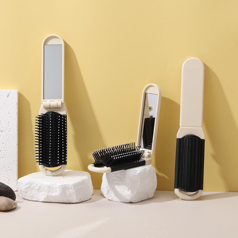 Shunfa plegable espejo peine de plástico de viaje portátil plegable airbag peine portátil espejo cosmético de doble uso integrado espejo peine