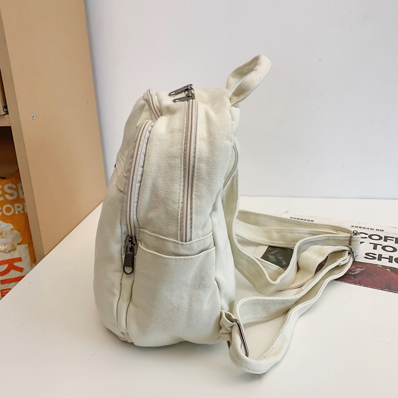 Mochila de lona para mujer 2024 nueva moda al aire libre viaje pequeño mochila casual todo fósforo clase mochila escolar marea