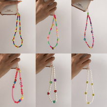 欧美创意夏季多元字母马卡龙色手机链 度假风笑脸蝴蝶花朵配饰女