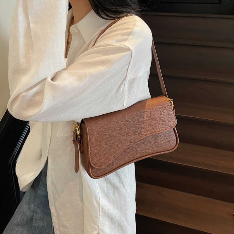 Bolso de textura transfronteriza 2025 verano nuevo bolso femenino moda patrón de lichi bolso de hombro simple bolso de mensajero de viaje