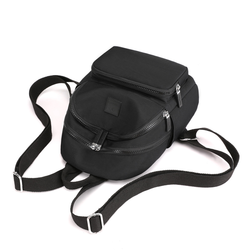 Simple estudiante mochila nueva mochila de las mujeres ligero impermeable bolsa de tela de nylon de gran capacidad bolsa de viaje al aire libre