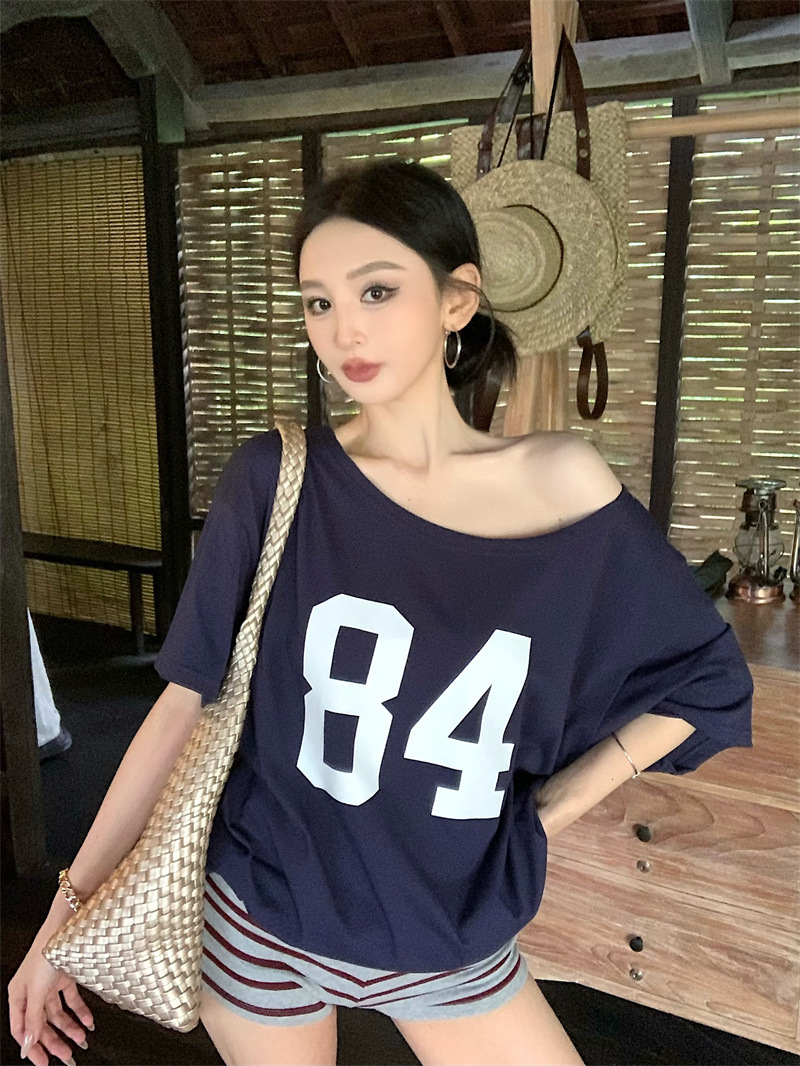 Copy_Navy blue printed slanted shoulder short-sleeved T-shirt for women in summer, lazy and loose American style.jpg