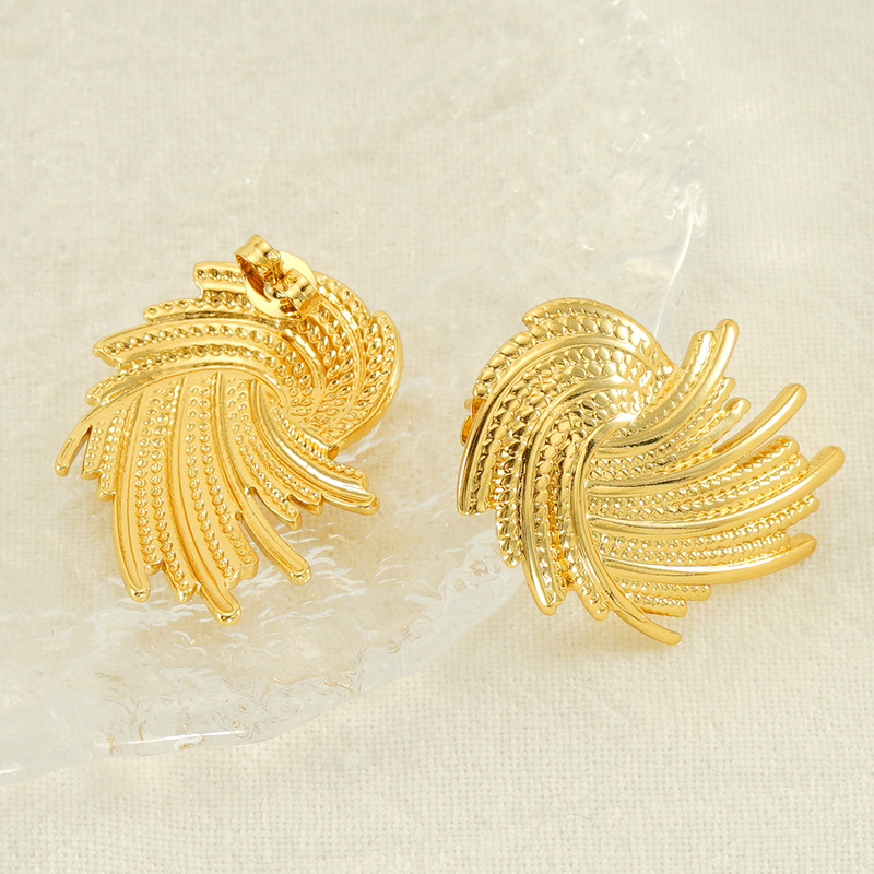 Europa y América transfronteriza personalidad exagerada línea trenzada espiral diseño pendientes en stock al por mayor