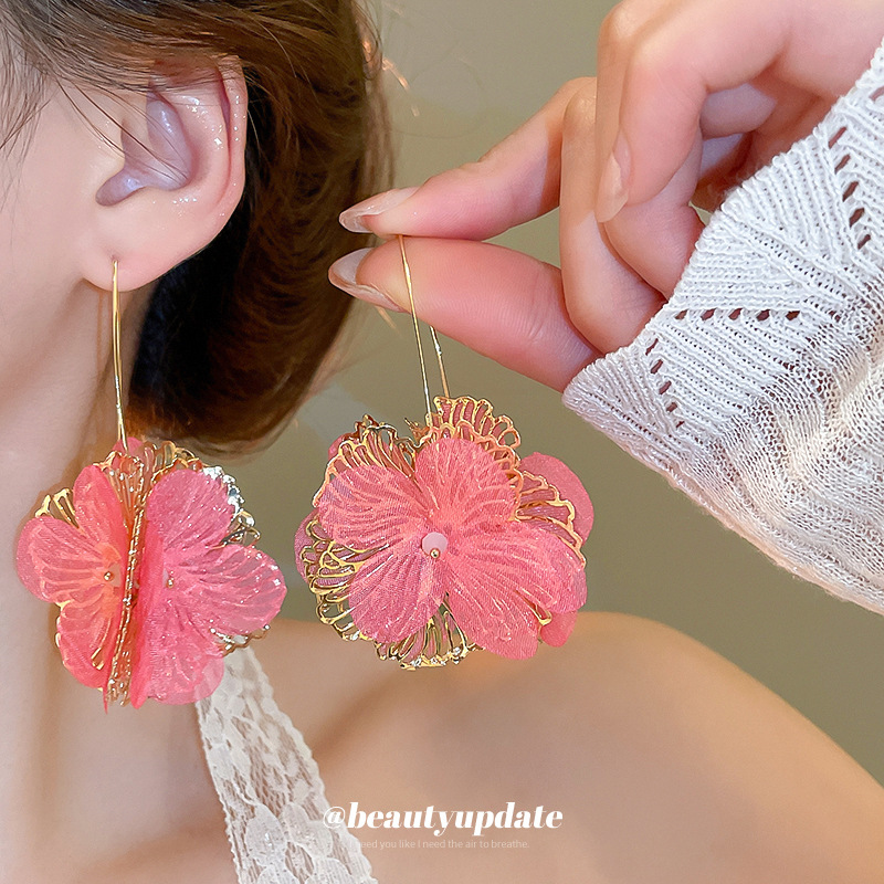 Pendientes de flores de moda coreana de nuevo estilo femenino fresco niña vacaciones viento gancho de oreja temperamento femenino pendientes de nicho de alto nivel