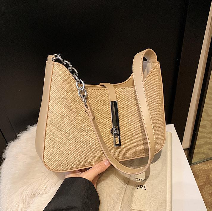 Nicho de diseño simple y versátil bolso de braza para mujeres 2025, nuevo estilo de alta calidad bolso de hombro de moda bolso de trabajo de viaje de mujer