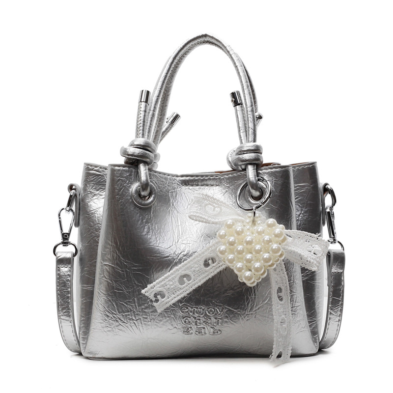 Bolso de mano de tendencia de comercio exterior femenino 2025 nuevo estilo plisado todo-fósforo bolso de hombro retro de alta gama ocio cubo bolso