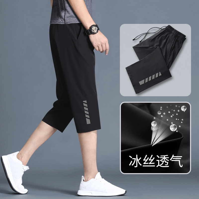 Pantalones cortos deportivos masculinos sueltos casuales 7 puntos pantalones secos rápidos 8 puntos de verano delgados 7 puntos pantalones de corrida de moda