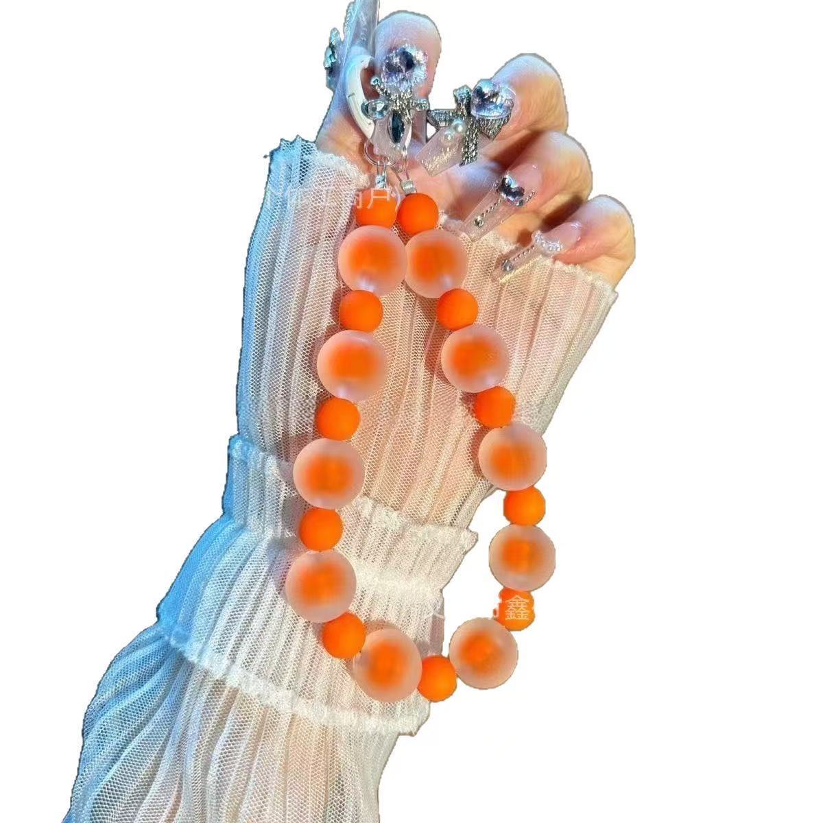 Nueva cadena de teléfono celular de color gelatina cuentas anti-perdida de doble hebilla pulsera de mano cadena llavero bolso colgante