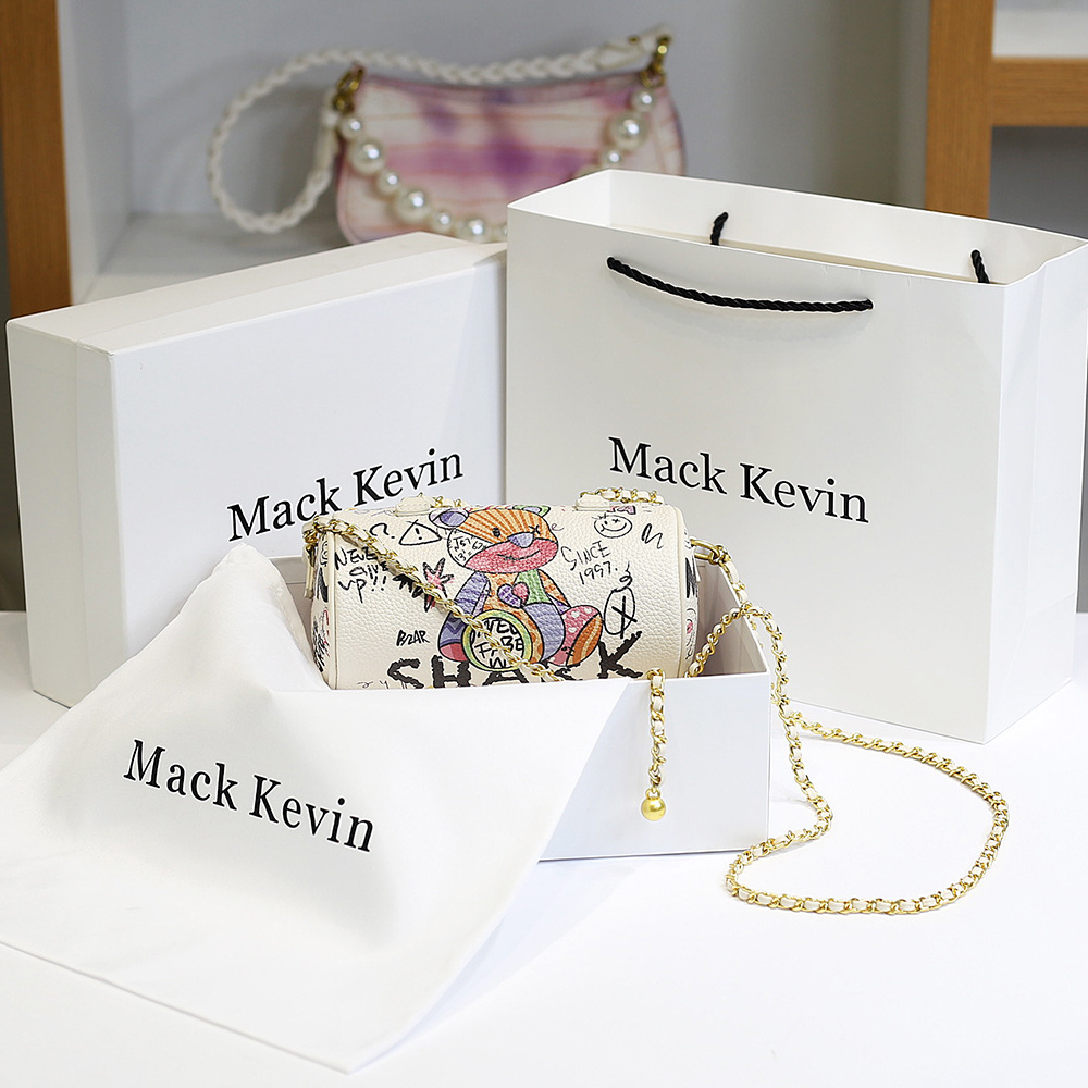 Bolso de mujer transfronteriza bolso de cilindro femenino 2023 nuevo oso graffiti cadena bolso de hombro bolsa de mensajero