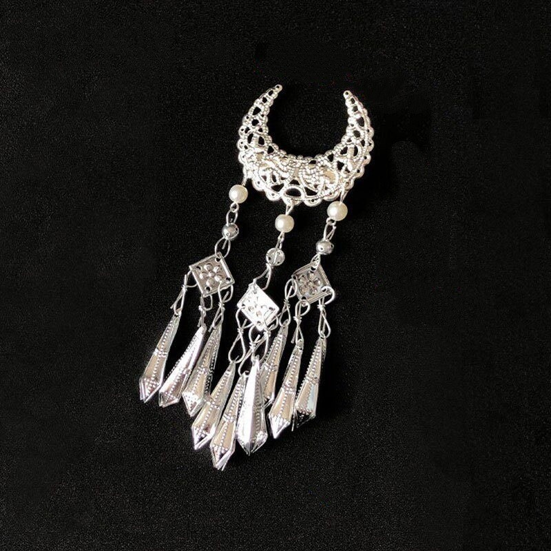 Crescent bell with long tassels