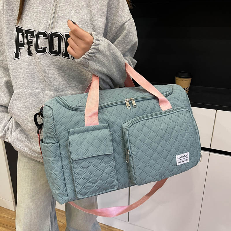 Bolsa de ejercicios de tendencia en relieve de diamante de gran capacidad de almacenamiento de zapatos separación seca y húmeda bolsa de yoga bolsa de viaje plegable