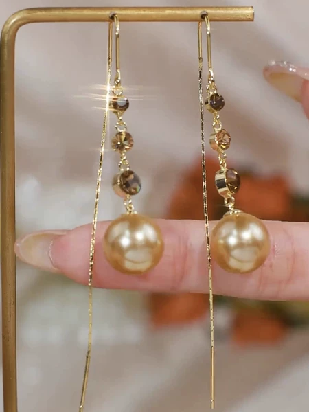 Earrings from pearl, champagne color