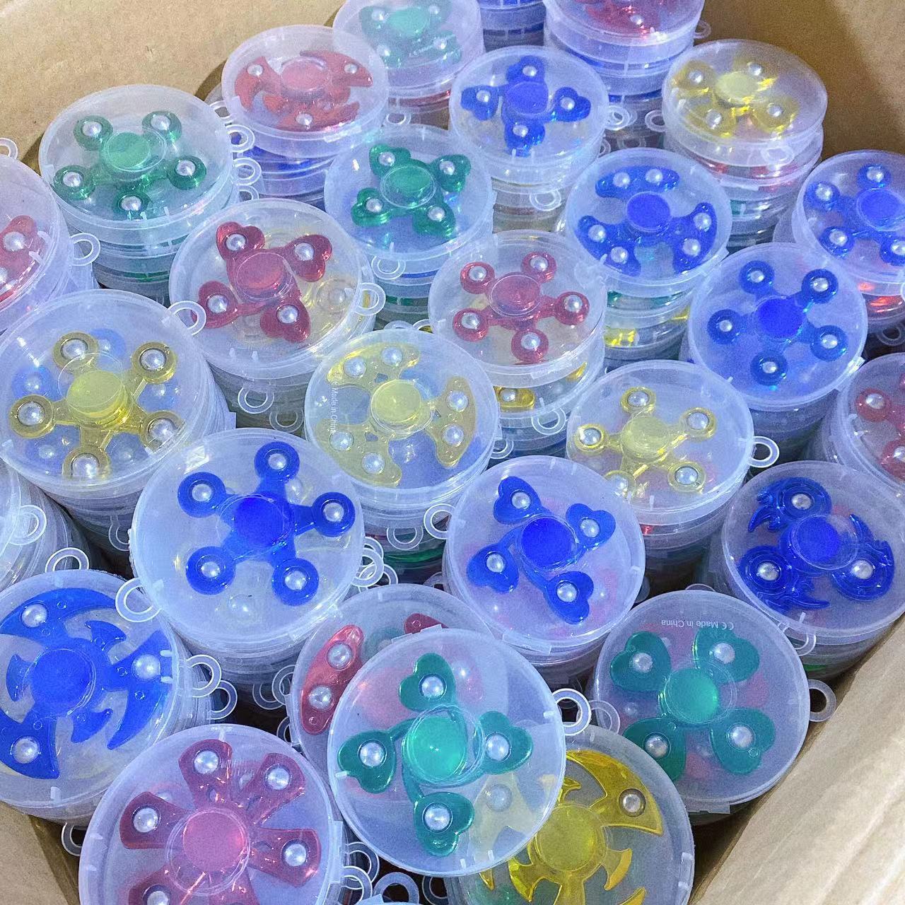 Giroscopio giratorio en caja de punta de dedo giroscopio galvanizado de plástico colorido girar le creativo mercado nocturno 2 juguetes de tiendas