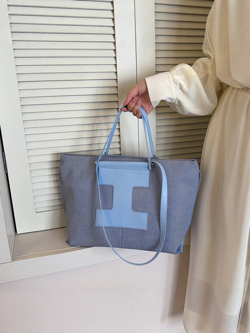 2026 nuevo bolso de hombro de viaje de gran capacidad de mujer bolso de moda versátil bolso de mano bolso de tendencia de diseño de color
