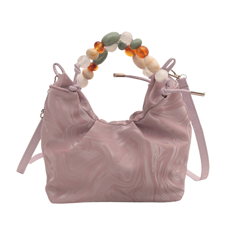 Nueva bolsa de estilo chino para mujeres 2024, nuevo verano, bolso de mochila de estilo exterior, bolso de cubo portátil super caliente.