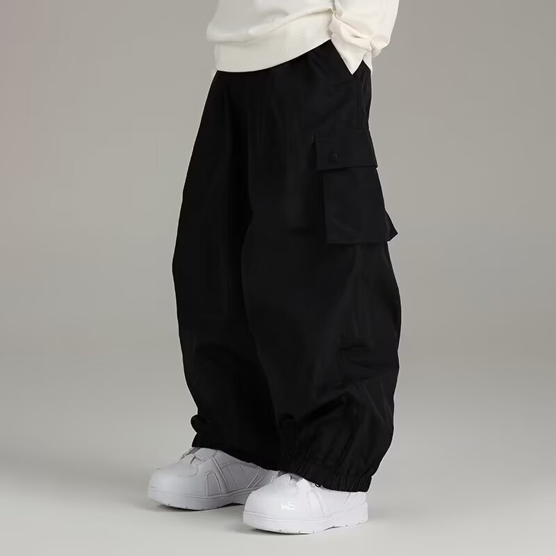 Snowboard pants are waterproof and windproof, unisex trendy brand loose-fitting pants for outdoor sports and casual wear with cuffed ankles Snowboard pants are waterproof and windproof, unisex trendy brand loose-fitting pants for outdoor sports and casual wear with cuffed ankles