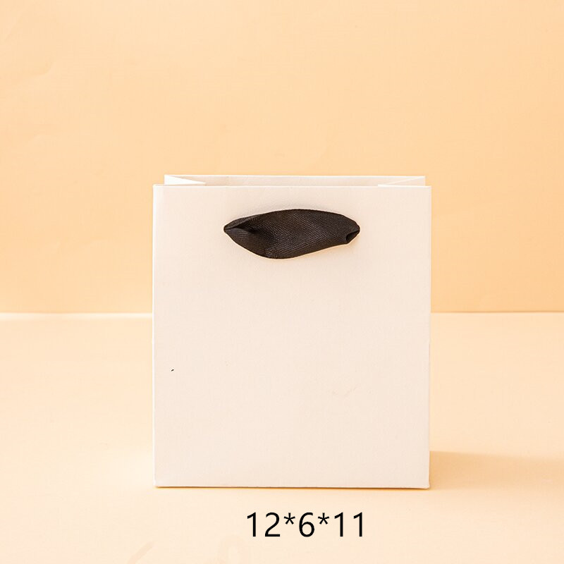 Fábrica en stock blanco negro caja de joyería luz lujo anillo pendientes caja de embalaje de la joyería