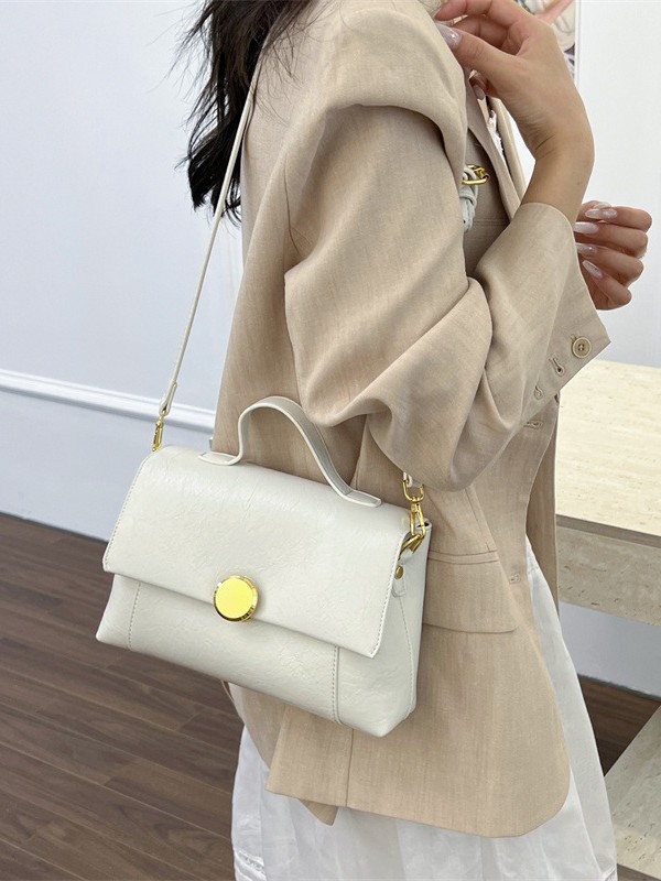 Bolso de mano de alta sensación para mujeres 2026 verano nuevo nicho de lujo ligero bolso cuadrado retrógrado ocio mochila de hombro