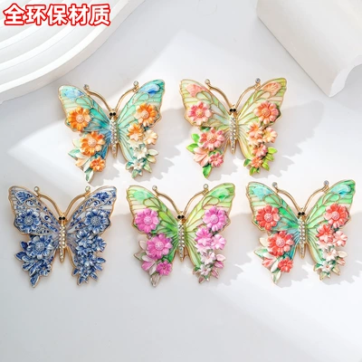 Vintage enamel flower and butterfly metal brooch with diamond embellishments, available in multiple colors, a women's accessory for everyday wear