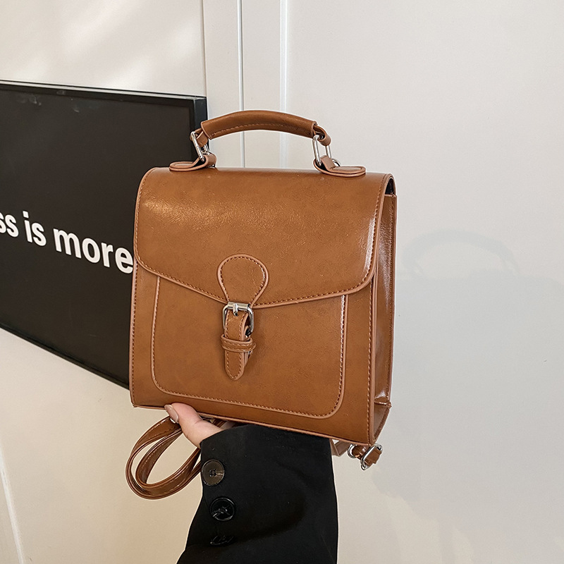 2025 nuevo estilo de moda de piel de cera de aceite de gran capacidad bolsa de viaje mochila multifuncional mochila de hombro color sólido