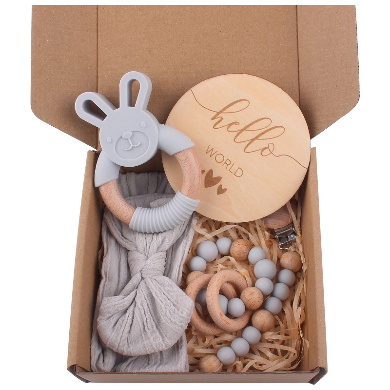 Nuevo bebé de dibujos animados de silicona conejo mordedor creativo bebé arco pelo banda chupete cadena cinco piezas traje