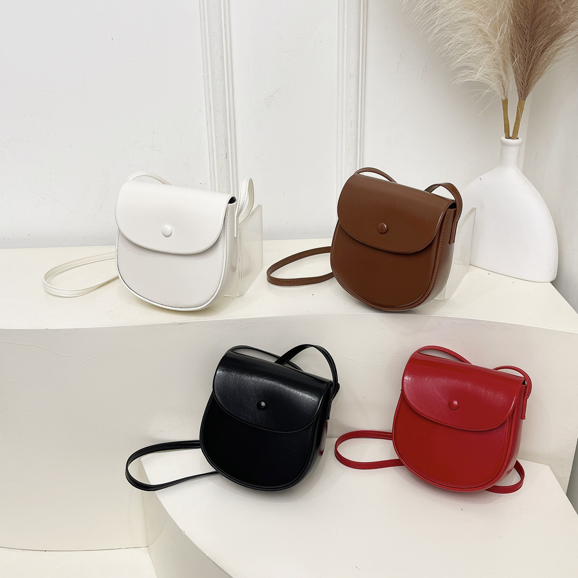 Verano nuevo mini bolso pequeño simple bolso cuadrado versátil bolso de cambio bolso de llaves bolso de hombro ligero de moda