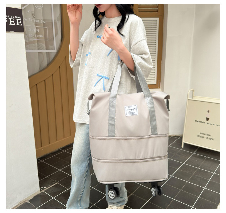 Extra large capacity travel bag, security lock universal wheeled maternity bag, short distance business trip airplane bag storage bag
