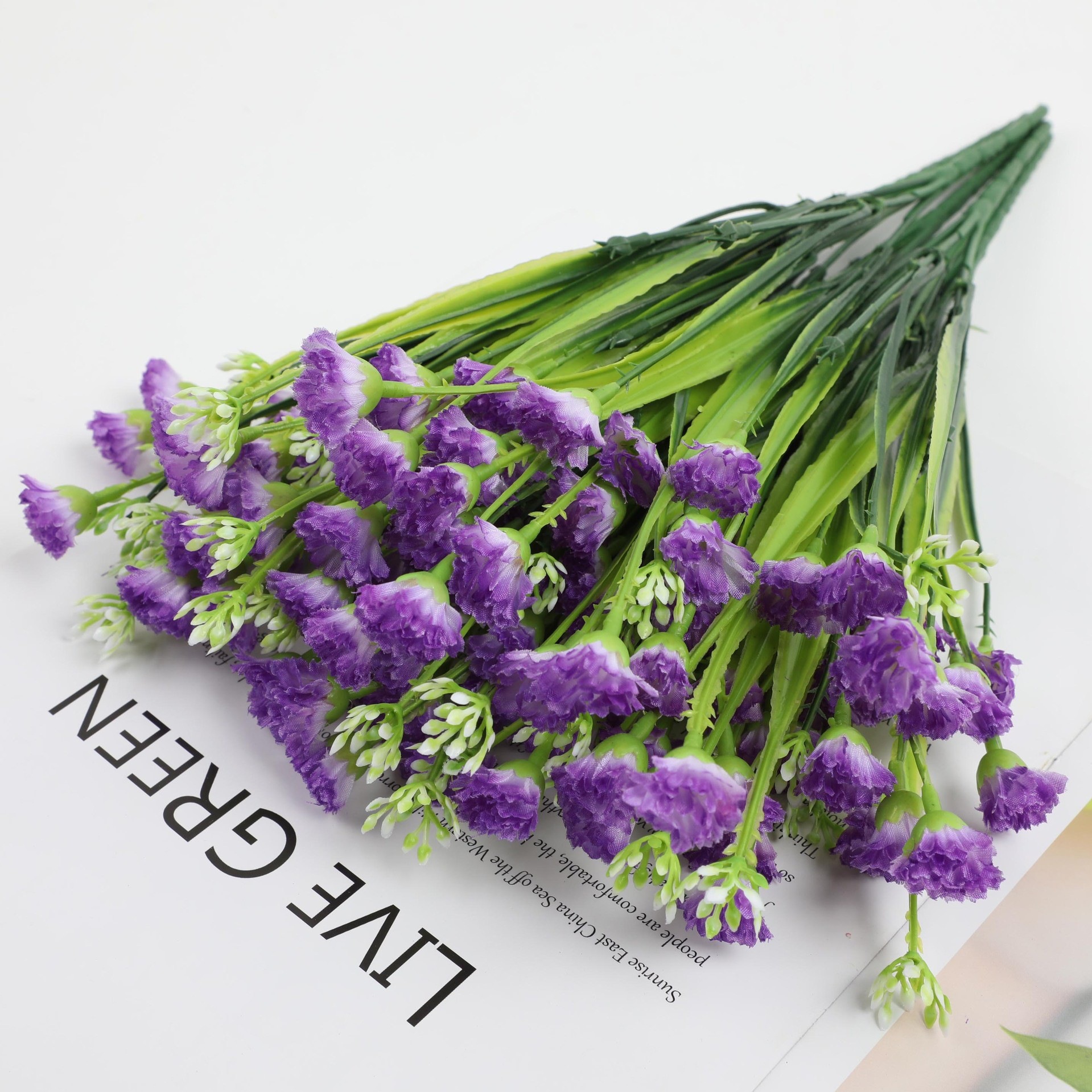 Simulación de plantas acuáticas plástico hierba de primavera flor violeta serigrafía hierba de primavera de cinco cabezas pequeña margarita flor falsa accesorios decorativos al por mayor