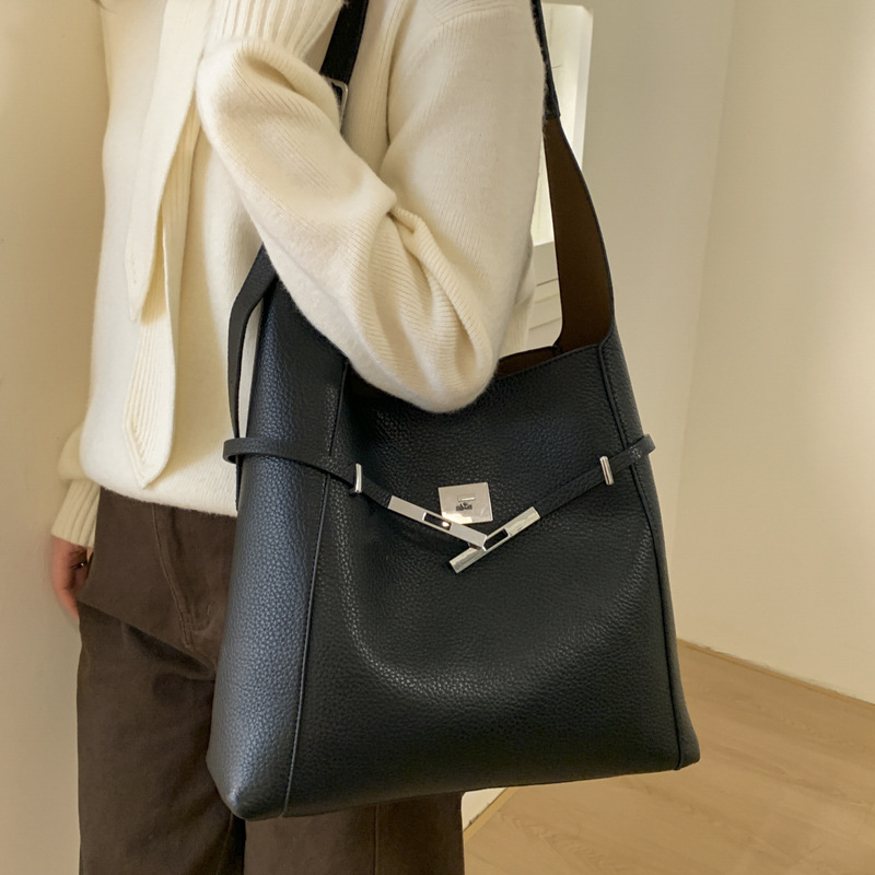 Transfronterizo de alto nivel nicho de hombro bolso de viaje bolsa para mujeres 2025 nuevo retro bolso de cubo