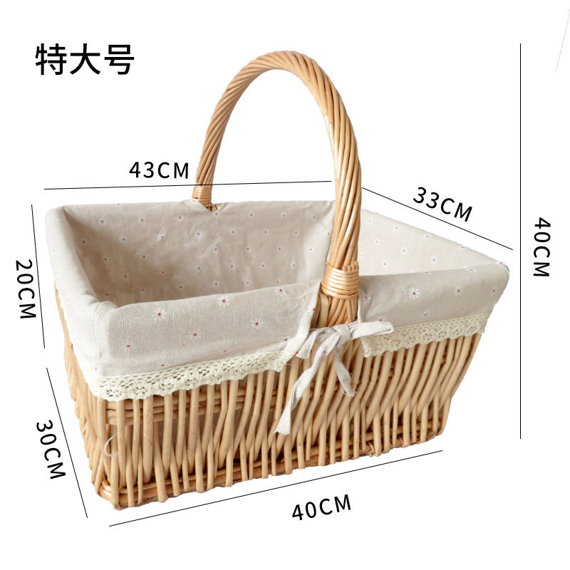 Cesta de almacenamiento de ratán directo de fábrica cesta de fruta de picnic portátil al aire libre cesta de mimbre tejida a mano cesta portátil