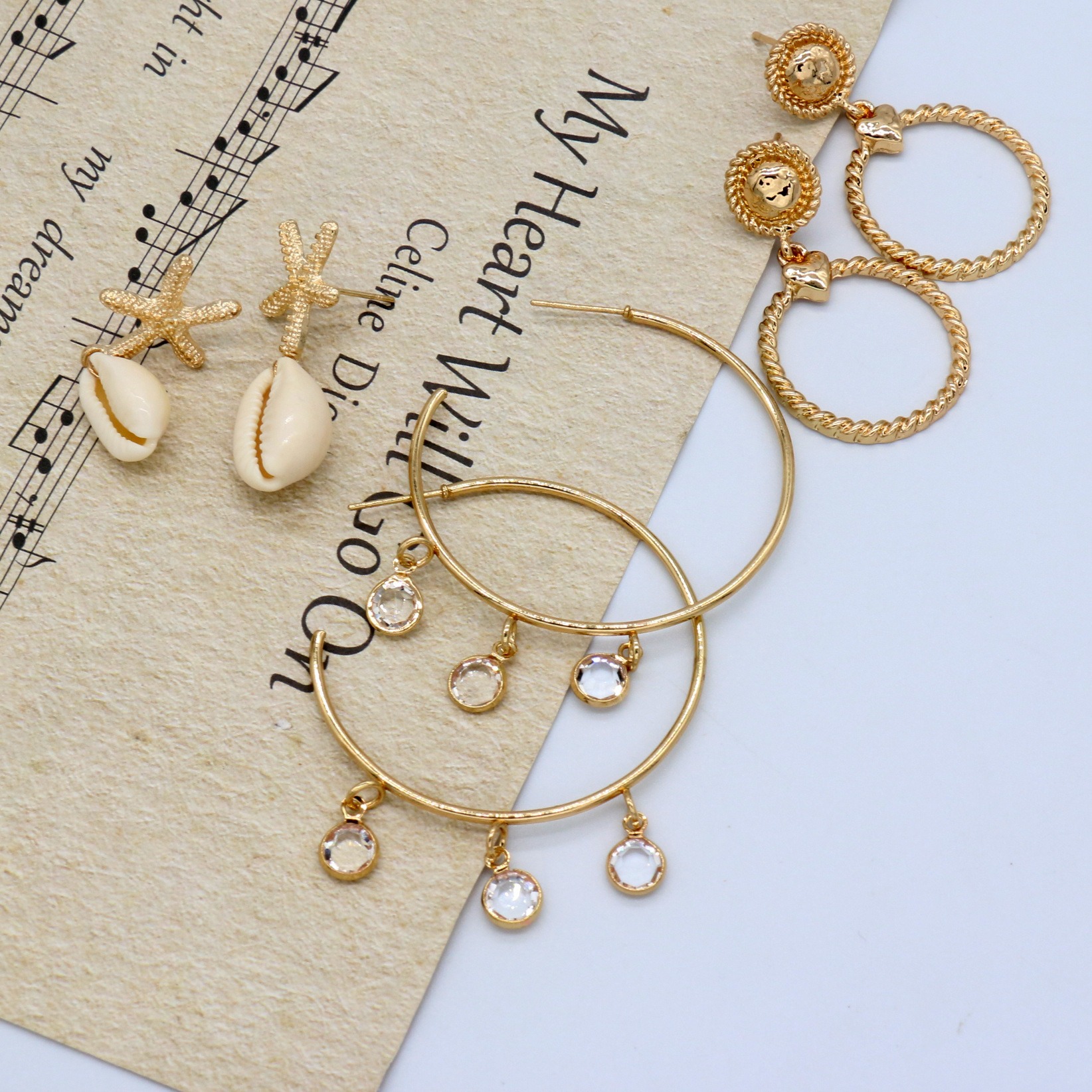 1 Jeu Décontractée Style Simple Rond Étoile De Mer Coquille Incruster Alliage Strass Boucles D'oreilles Boucles D'Oreilles display picture 3